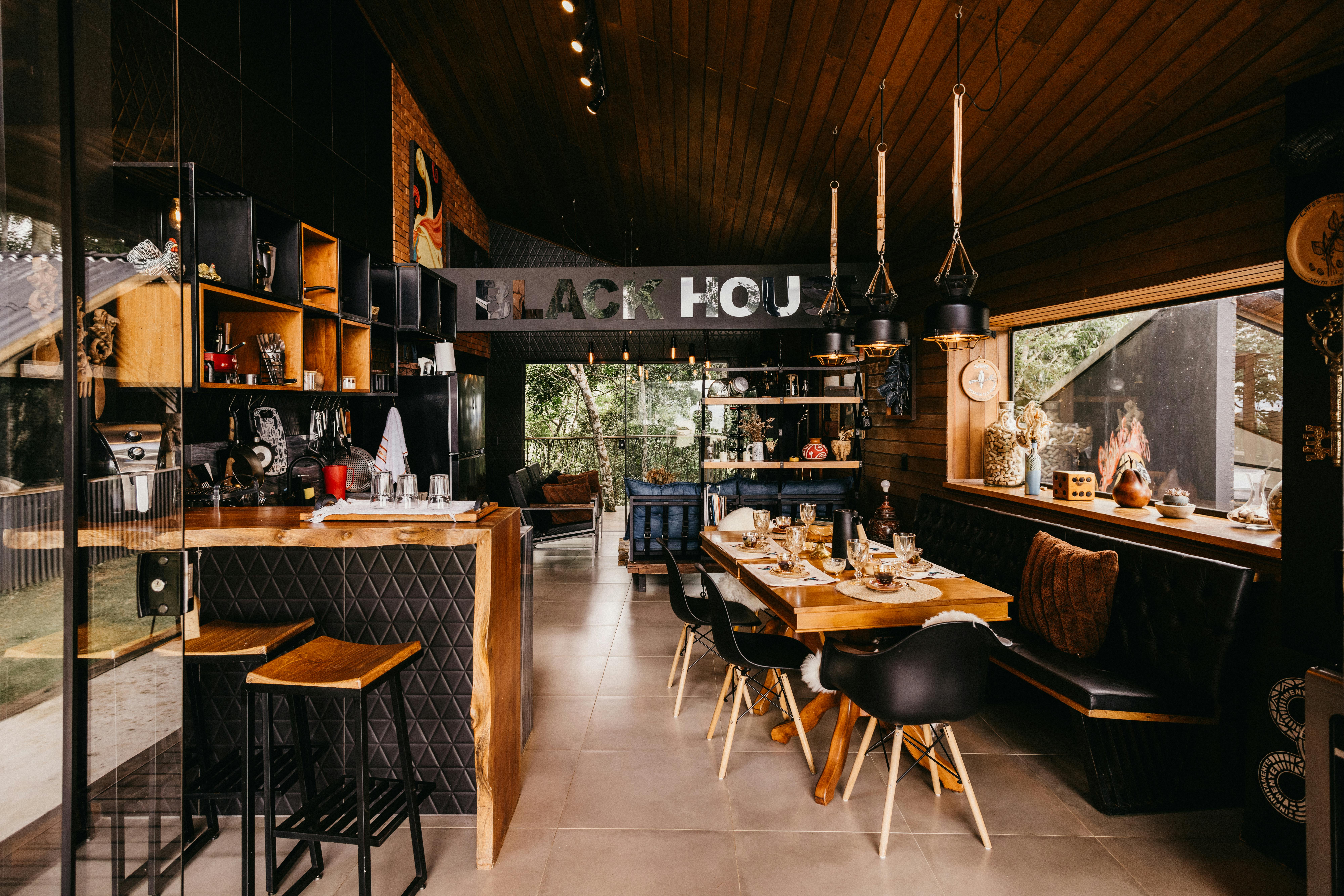 Warm and inviting restaurant interior with rustic design elements in Brazil.