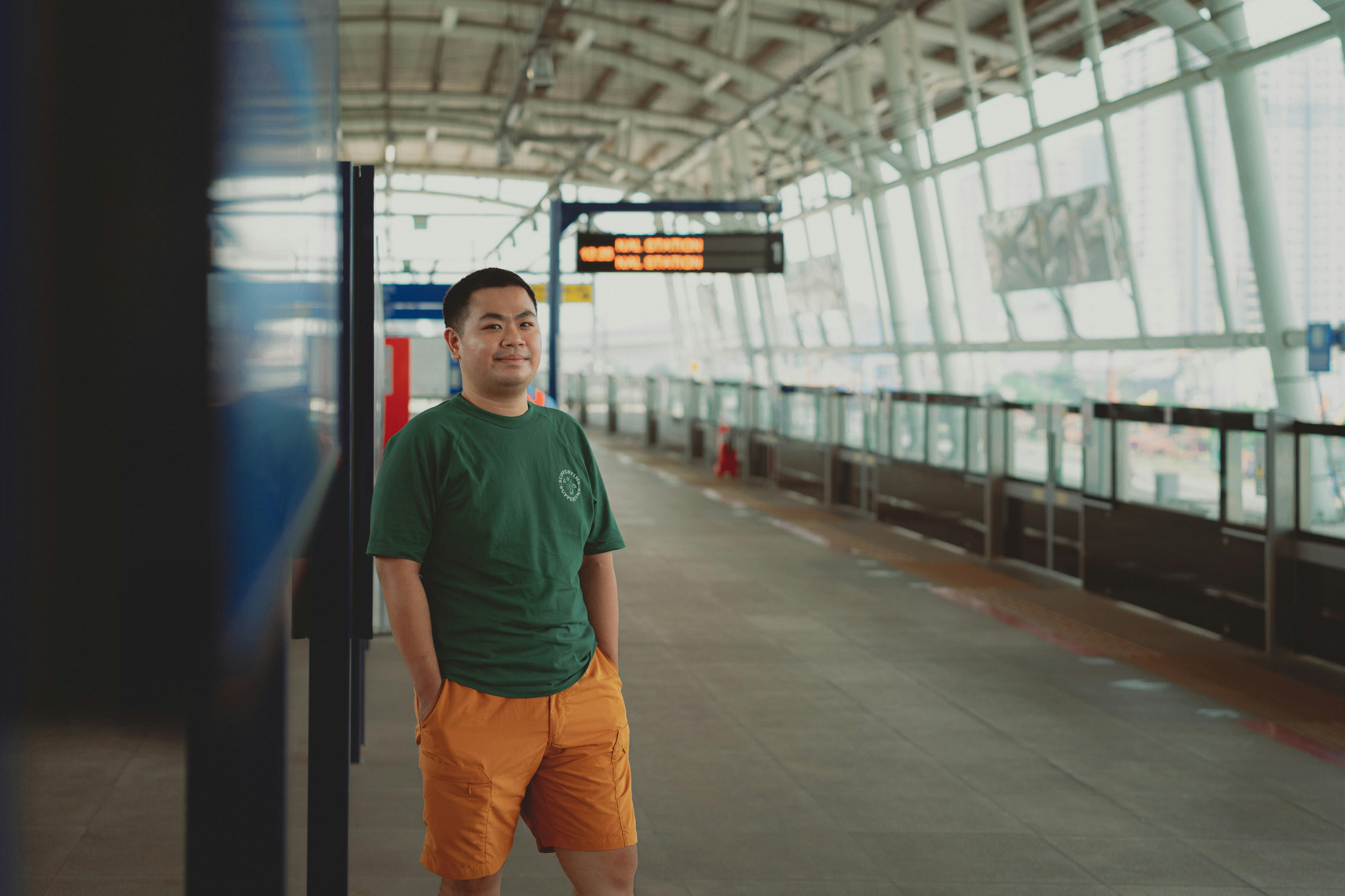 person standing at ho chi minh city metro station