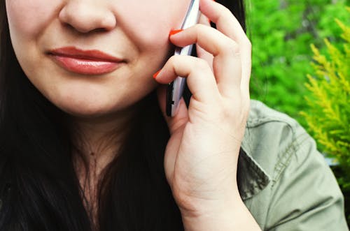 Woman Holding Smartphone