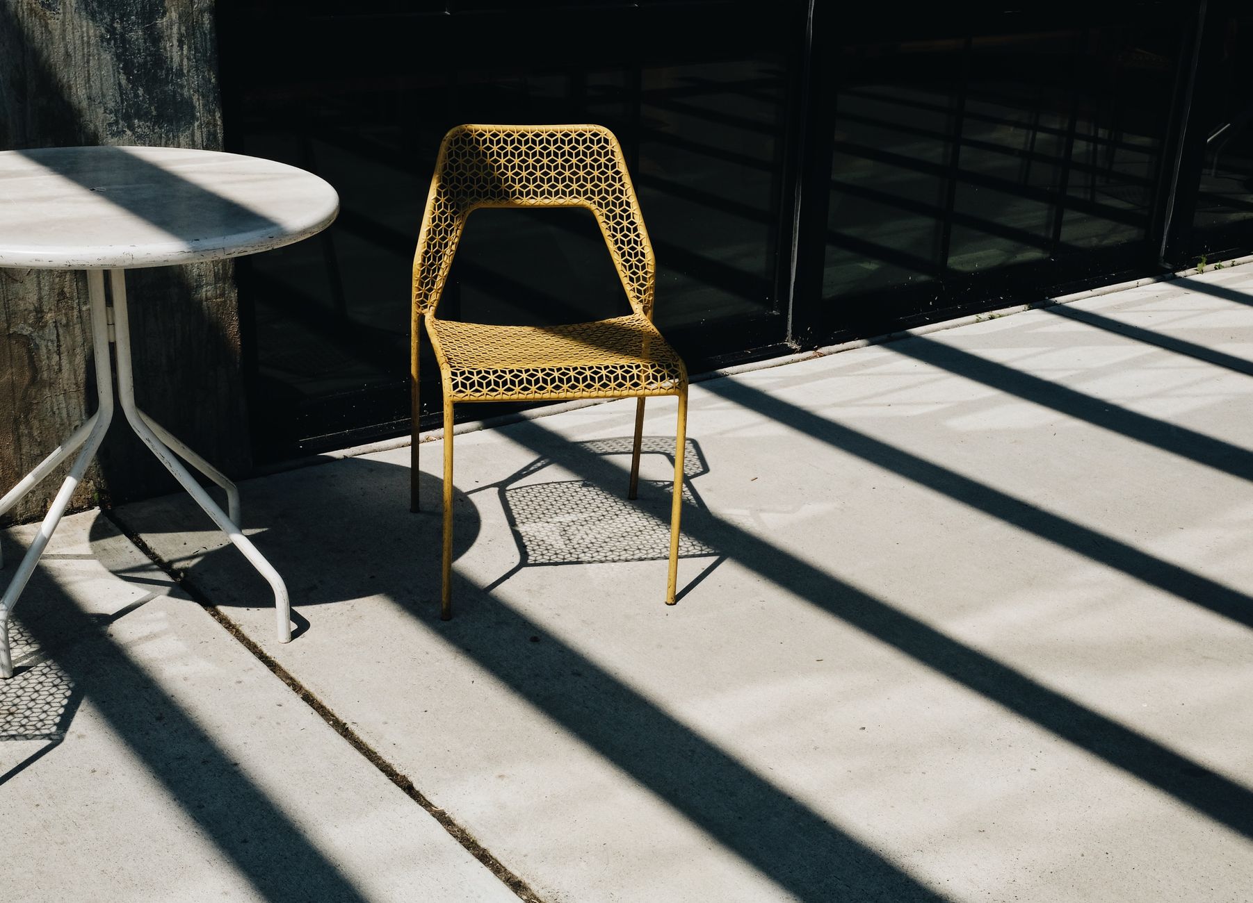 Stylish modern patio furniture arrangement on a bright sunny summer day in Ontario. Stylish modern patio furniture arrangement on a bright sunny summer day in Ontario.