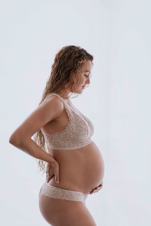 Pregnant Woman in Lingerie with Calm Expression Free Stock Photo Pregnant Woman in Lingerie with Calm Expression Free Stock Photo