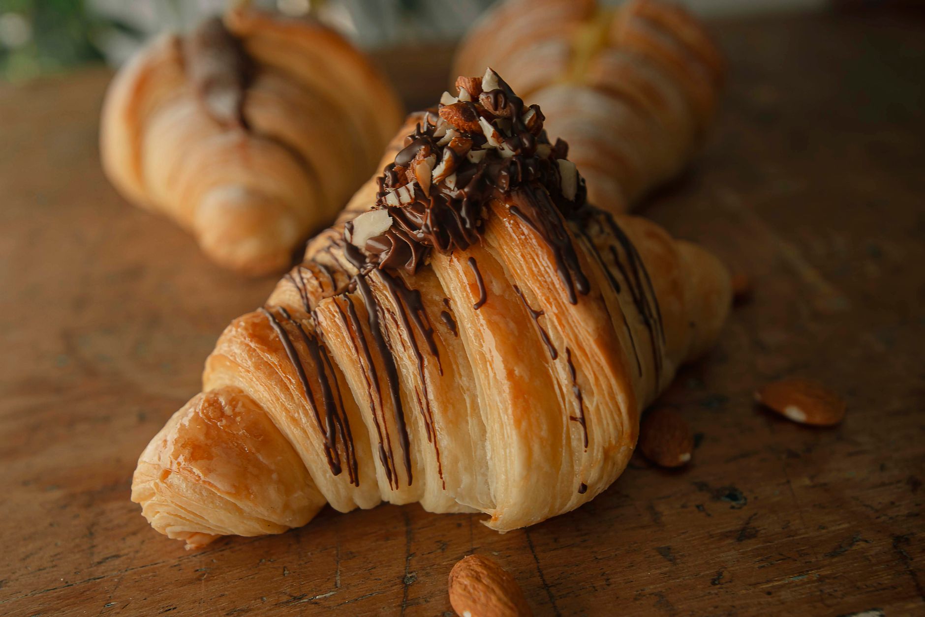 Croissants stored in a freezer bag with labels