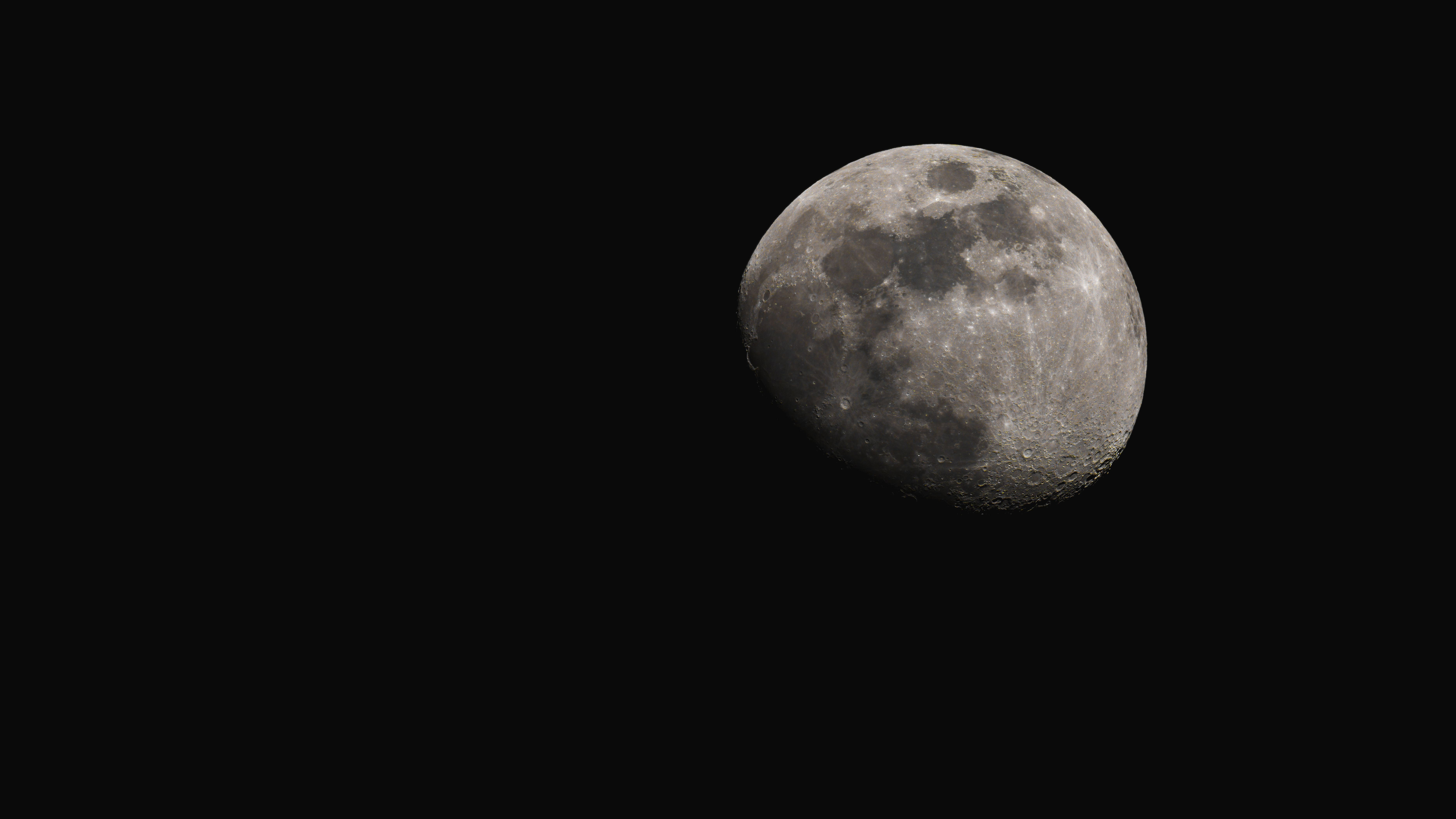 Detailed Moon Surface Against Dark Sky · Free Stock Photo