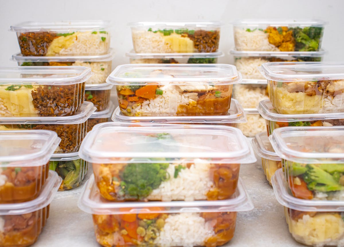 Chef-prepared get well meal gift containers with comfort food including rice, chicken, broccoli, and vegetables - SendaMeal.com