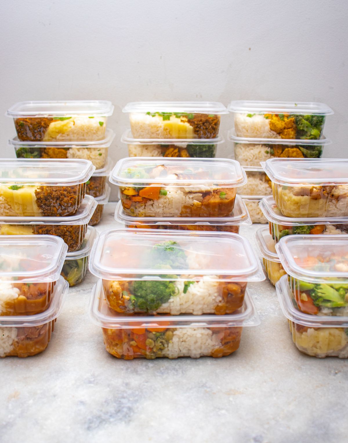 Healthy meal prep containers with rice and vegetables
