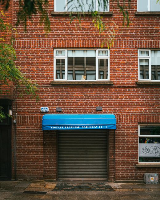 closed shop storefront in downtown street