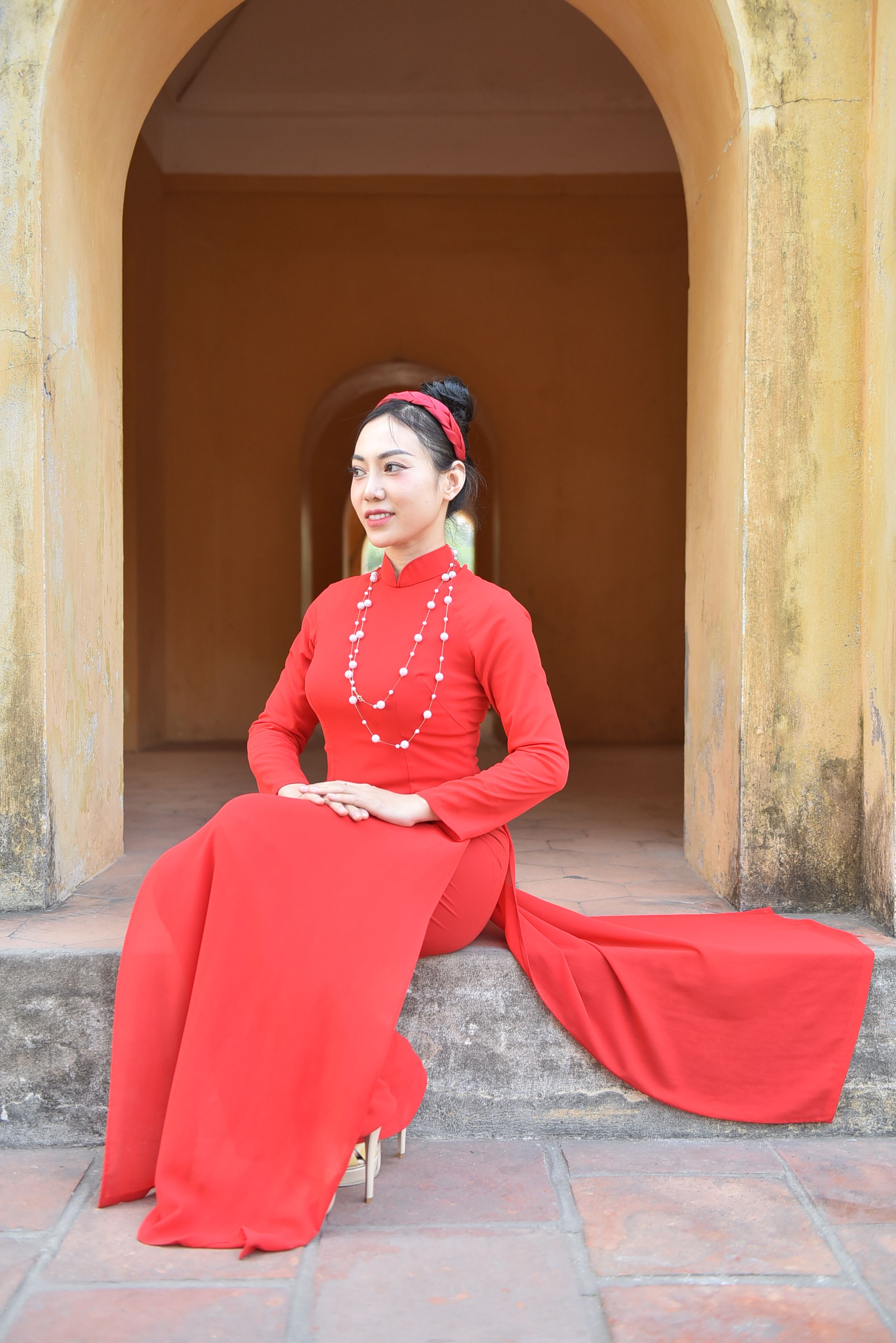 Woman In Red And Black Dress Posing For A Photo · Free Stock Photo