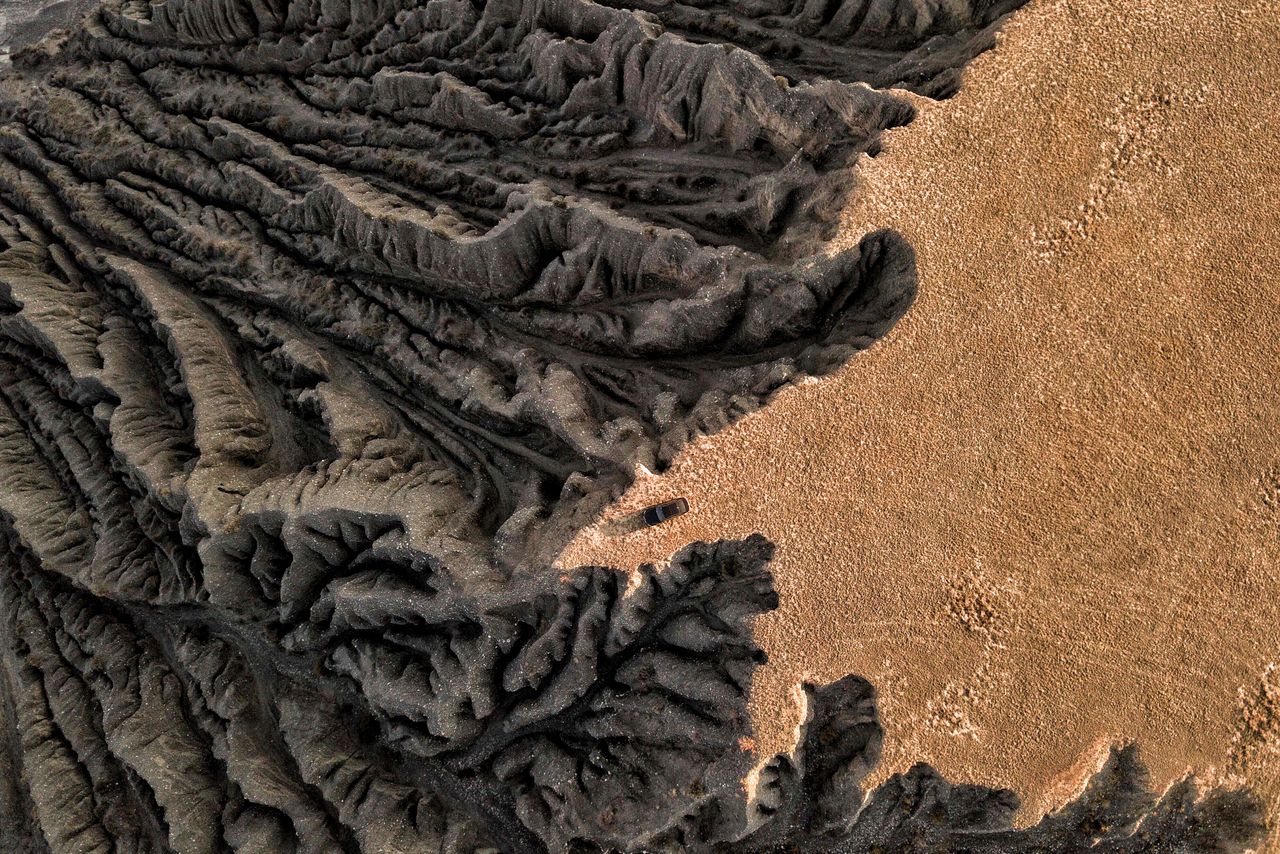 drone capture of a barren eroded geological formation in a desert show
