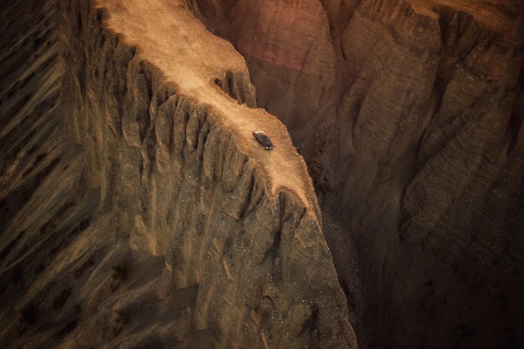 Aerial Photo Of Car Near Cliff