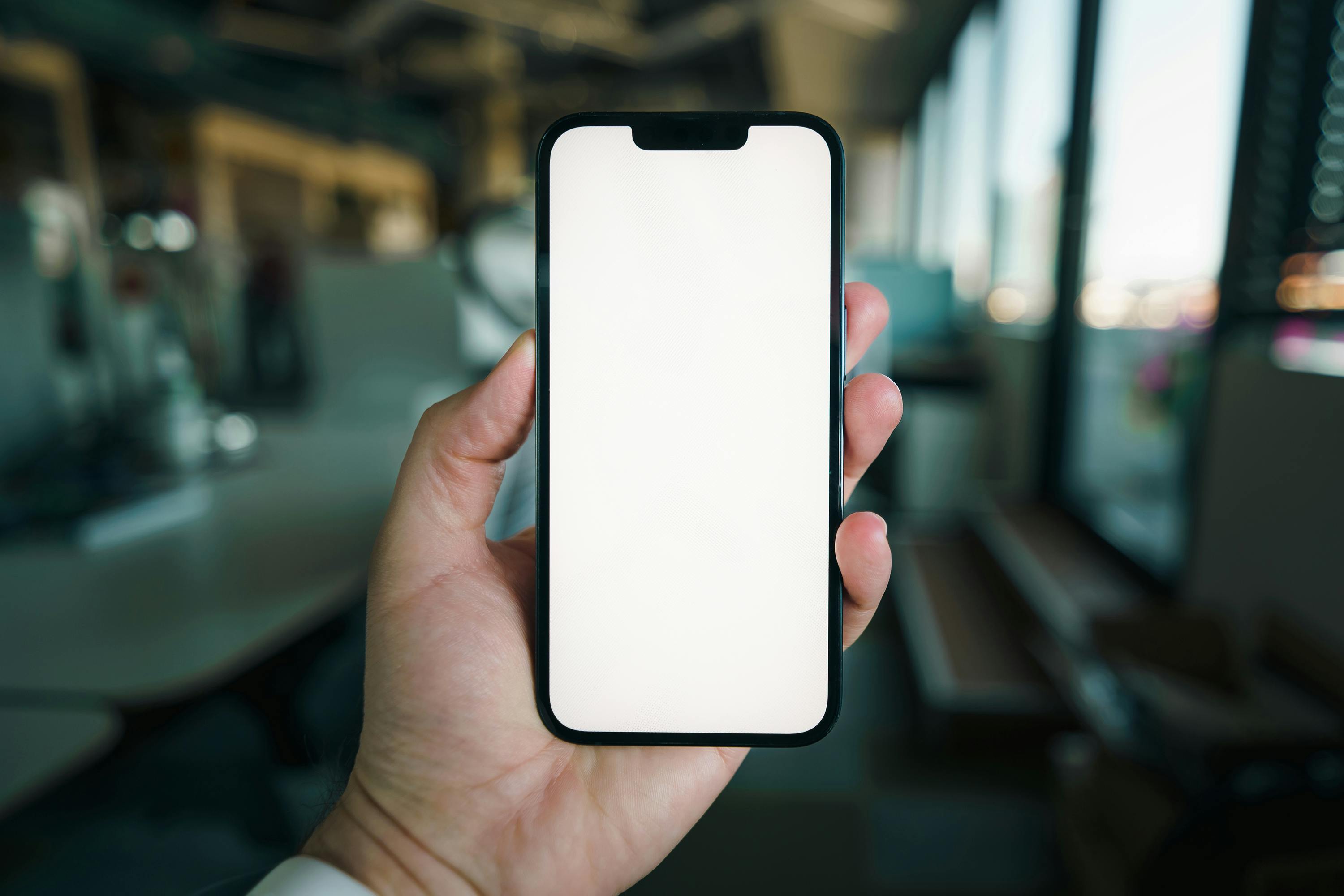 Business professionals gathering around a tool-free trade show stand with a modern conference backdrop