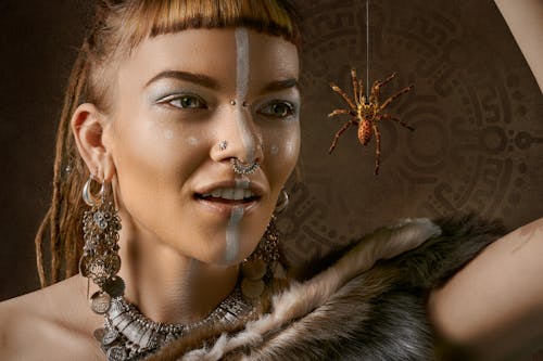 Free Woman Looking on Spider Stock Photo