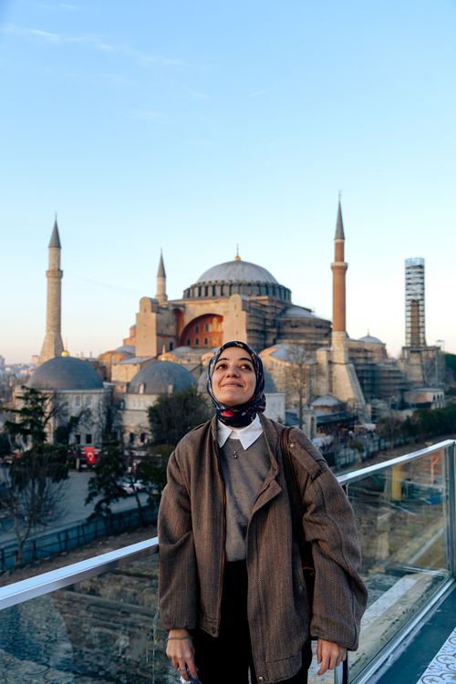 Free Woman wearing a hijab gazing at Hagia Sophia during the day in Istanbul, Turkey. Stock Photo