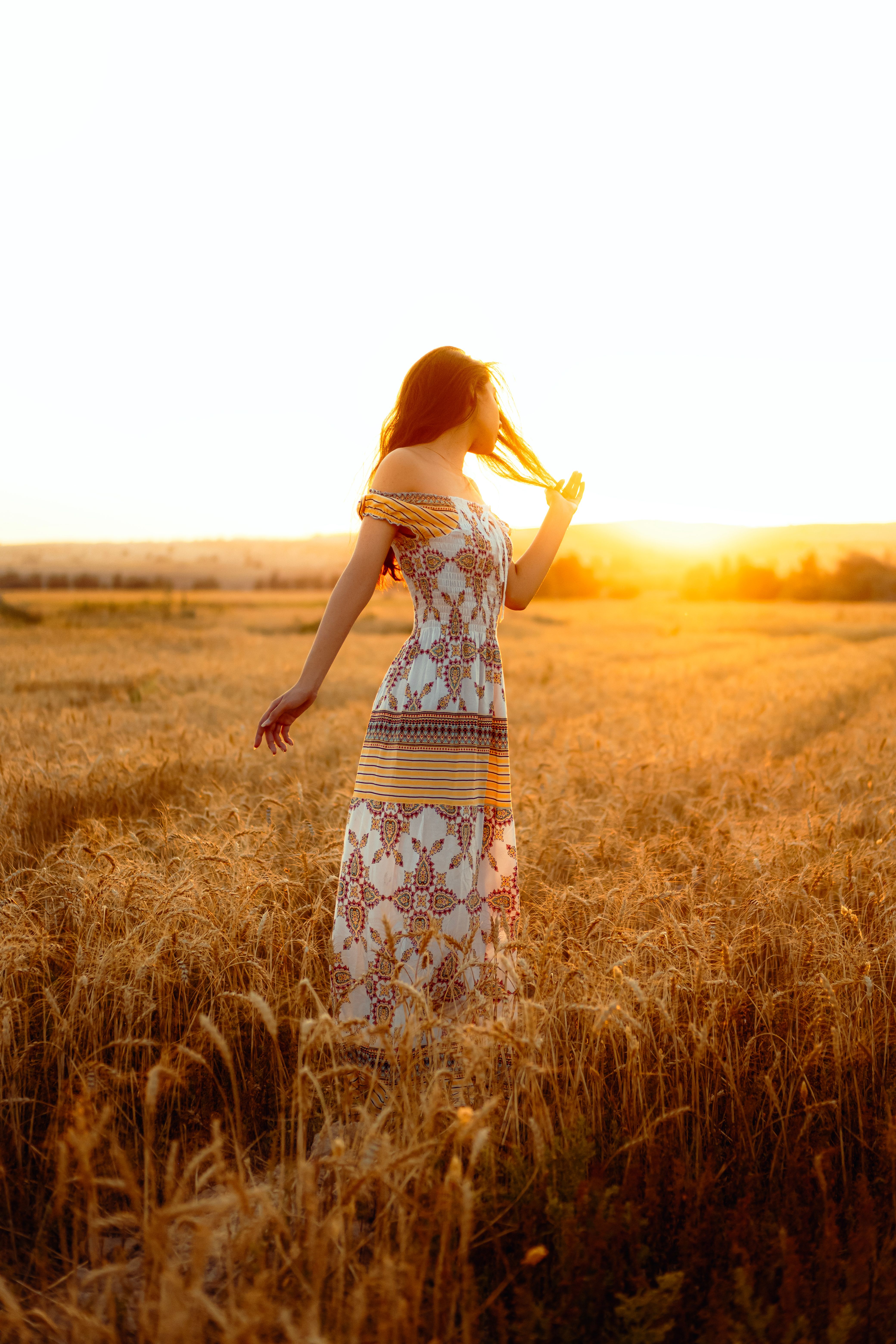 Woman in Summer Dress at Sunset in Wheat Field · Free Stock Photo
