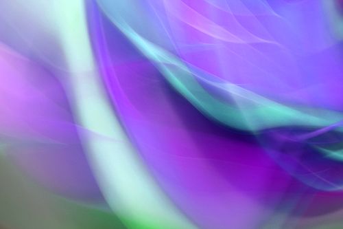Free Vibrant abstract image with flowing purple and green hues, creating dynamic surreal effects. Stock Photo