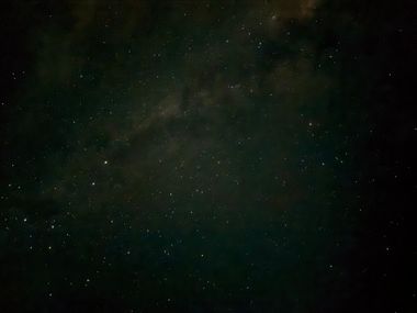 Stars over a dark ridge — photo by Leonardo Flores on Pexels