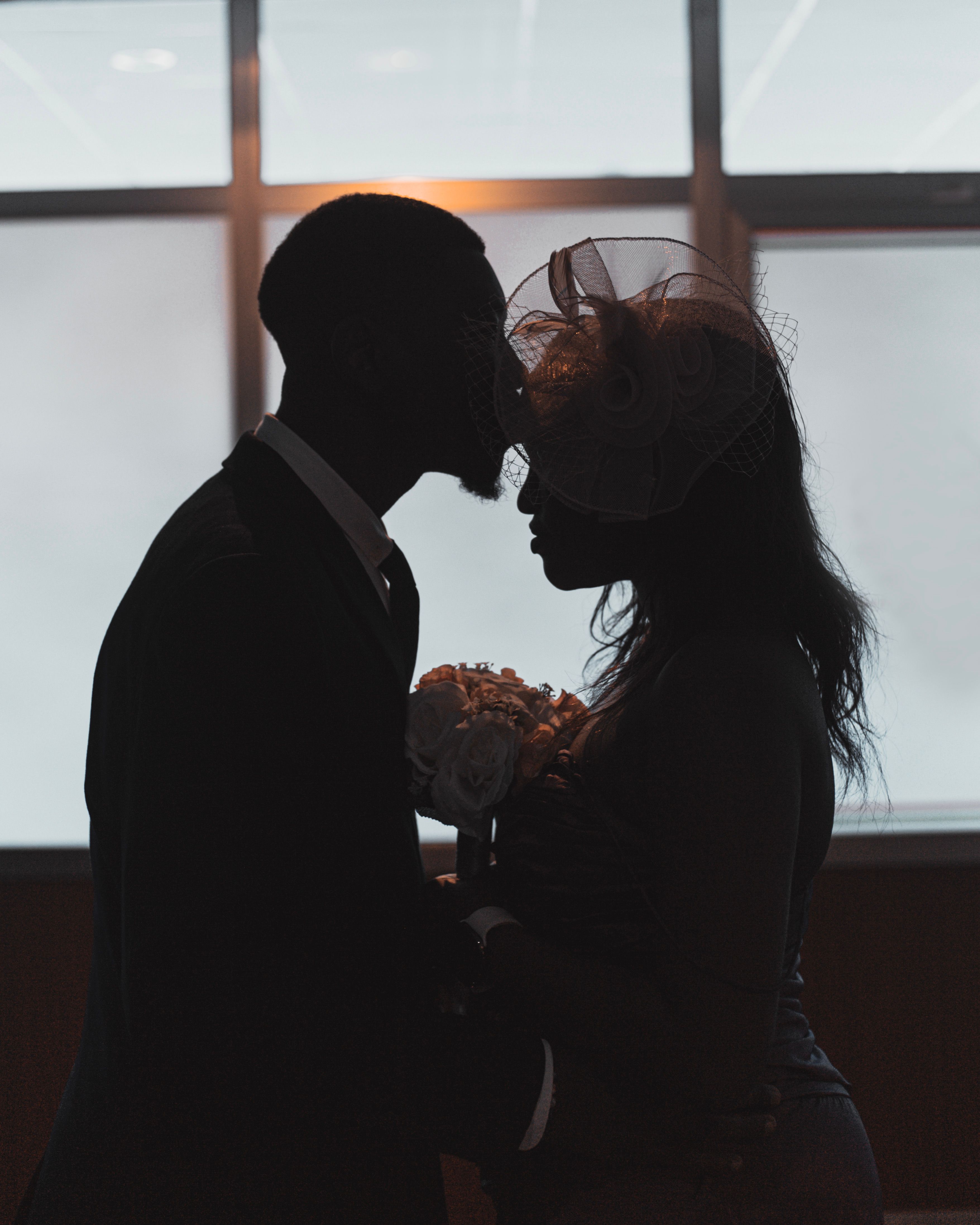Silhouette of Romantic Couple Sharing Tender Moment · Free Stock Photo
