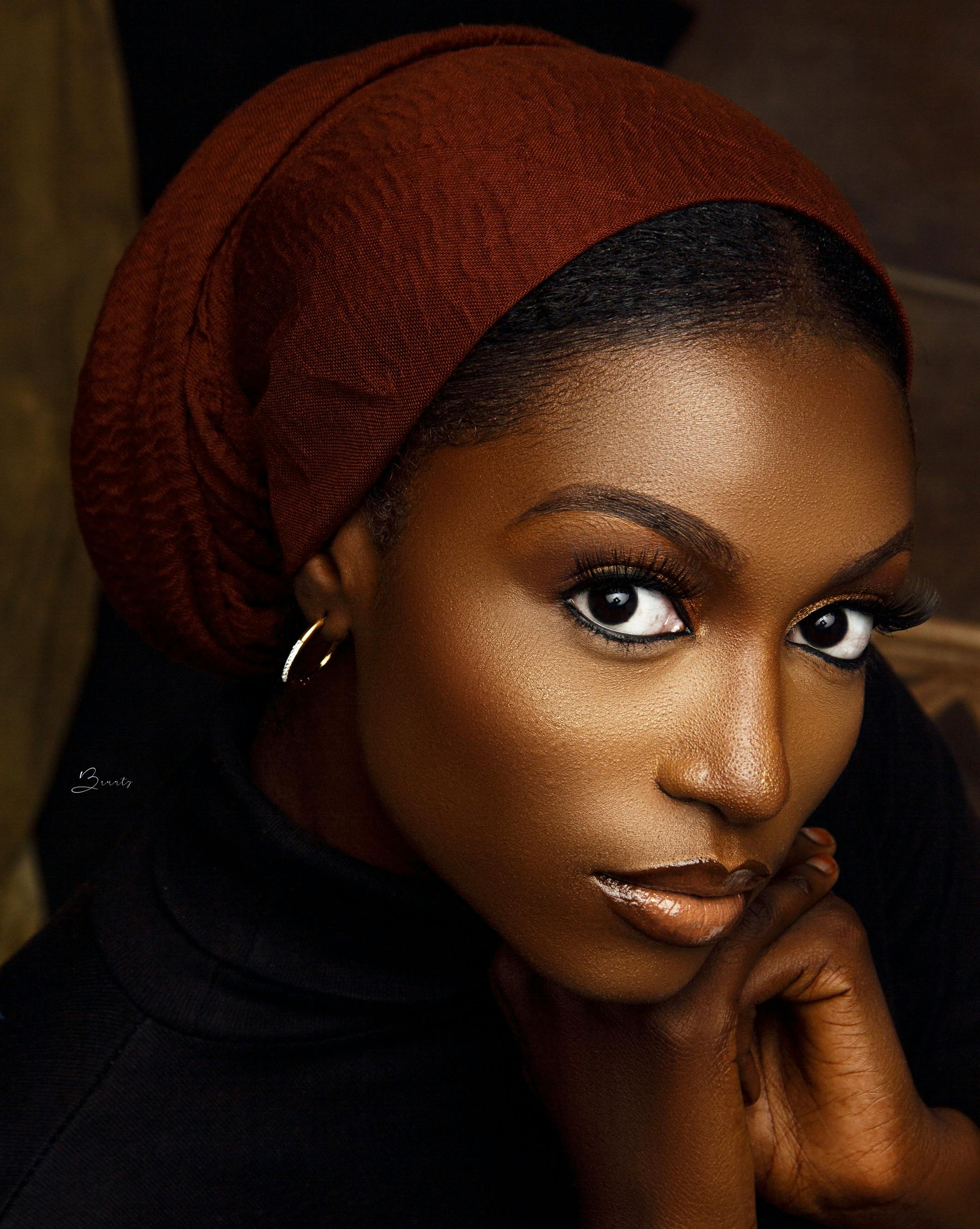 elegant portrait of a woman with headscarf