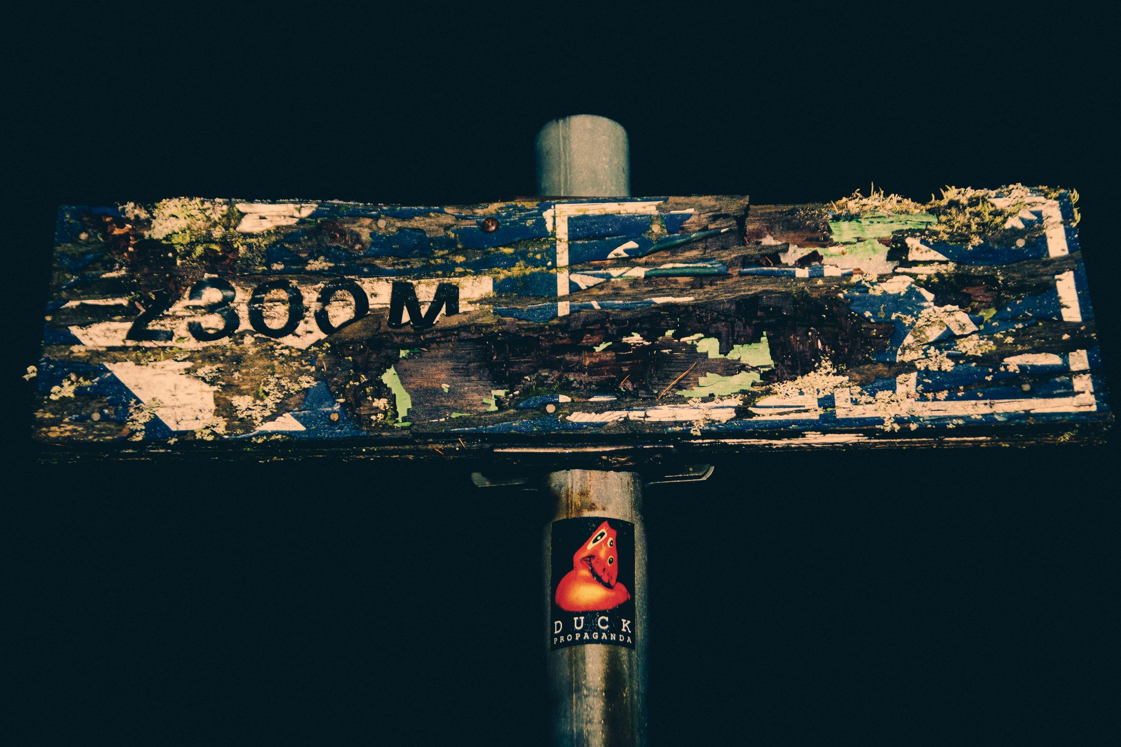 Rustic Sign with Weathered Texture at Night · Free Stock Photo