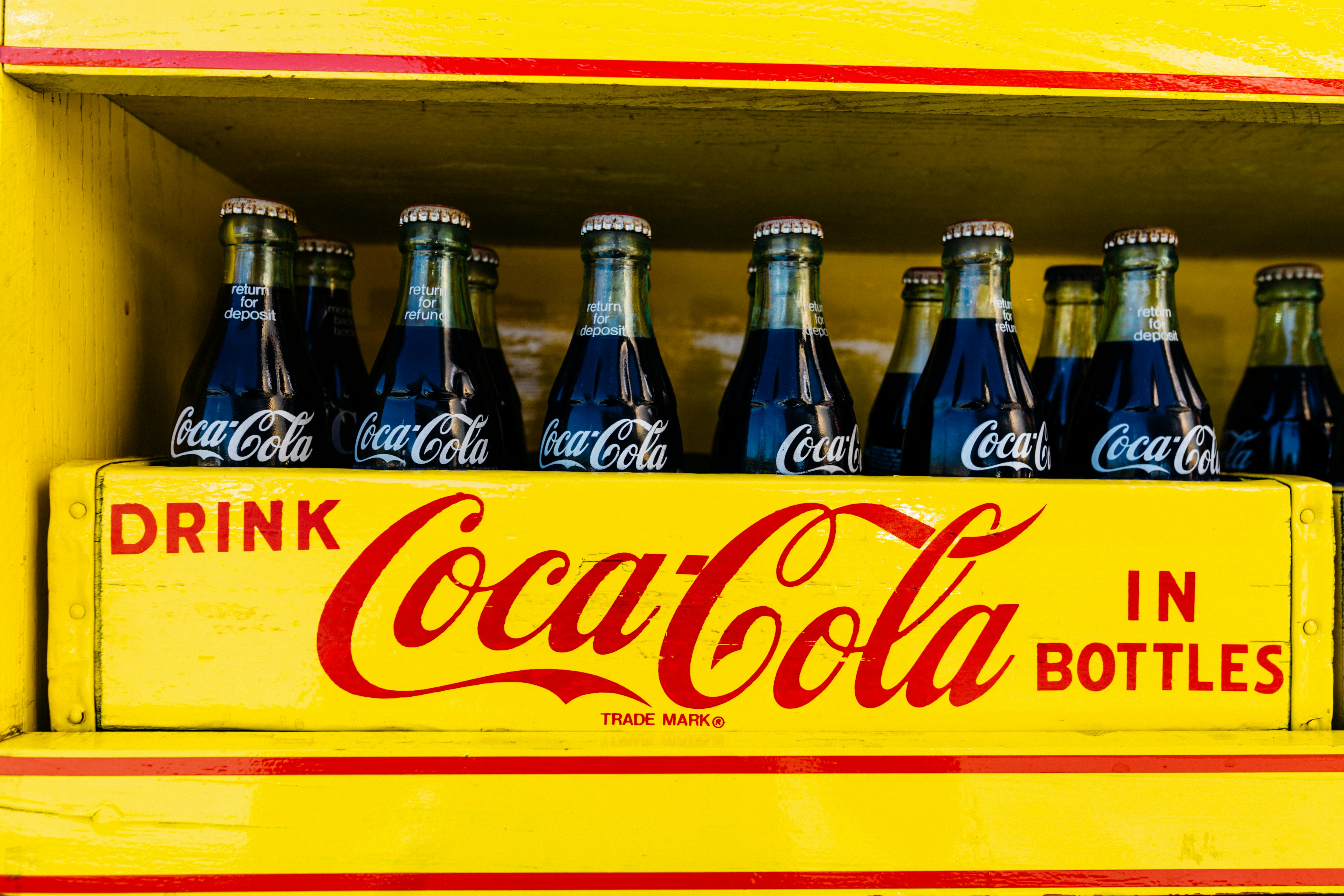 Cocacola Bottles in Yellow Crate · Free Stock Photo