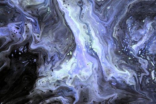 Captivating abstract fluid art in blue and black, perfect for modern decor.