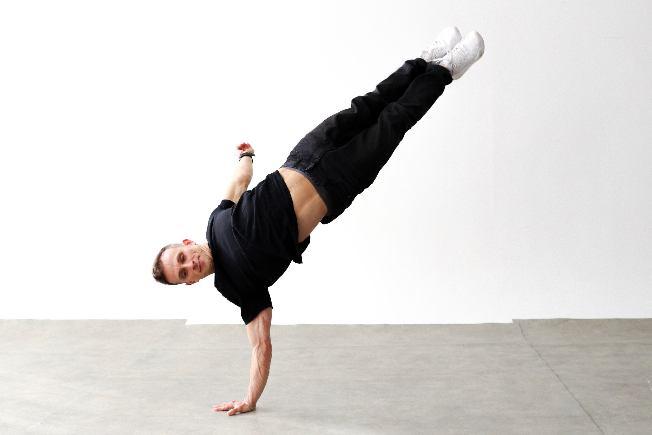 Dynamic Breakdancer Performing a Handstand in Berlin · Free Stock Photo