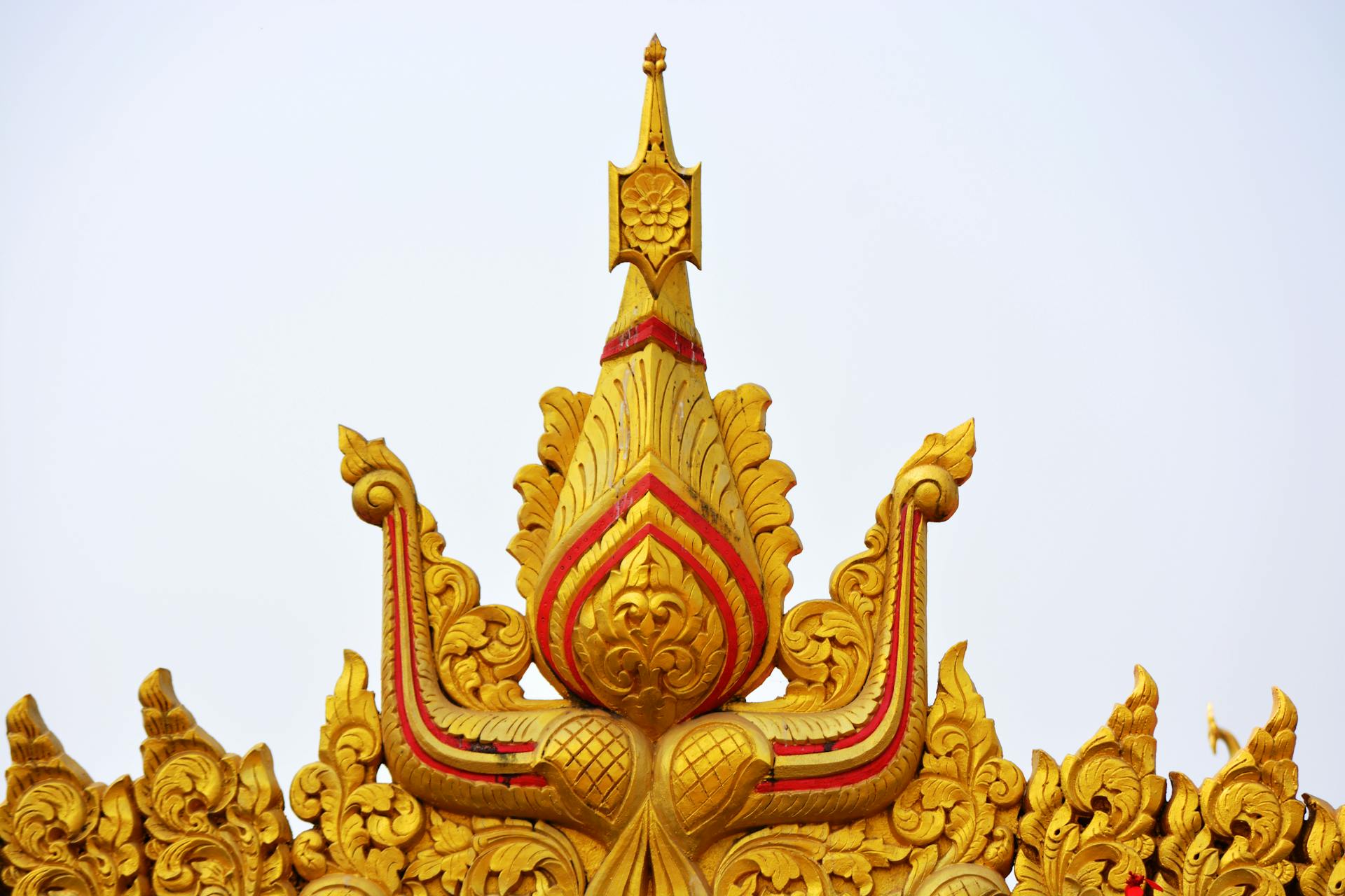 Incredible golden decorative detail of Buddhist architecture in Mumbai, India.