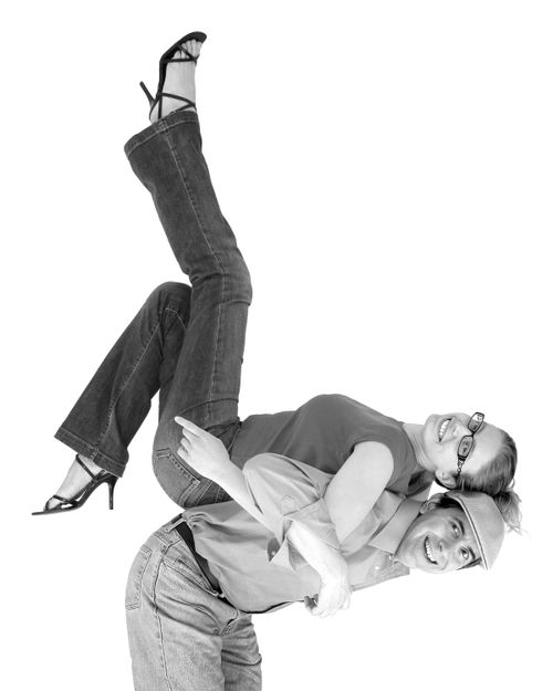 Free A joyful swing dance lift featuring a joyful couple, highlighting exuberance and fun in dance. Stock Photo