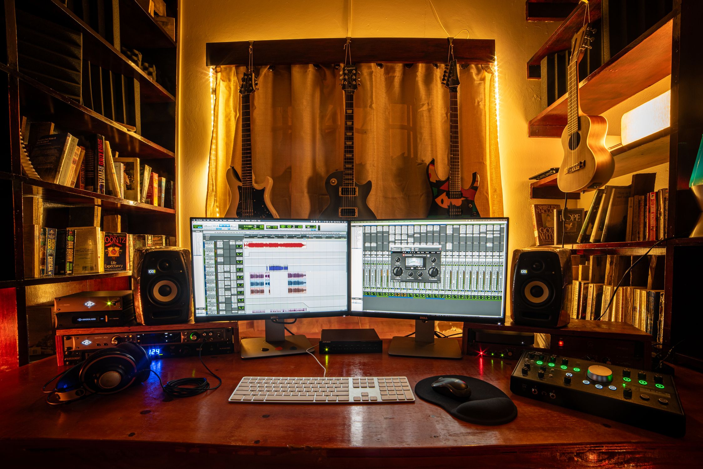 Cozy Home Music Studio with Guitars and Equipment · Free Stock Photo