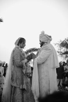 A couple exchanges vows in a beautiful traditional Indian wedding ceremony.