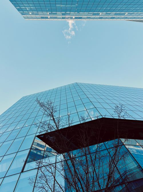 Free Glass skyscraper with clear sky, reflecting urban modernity and architecture. Stock Photo