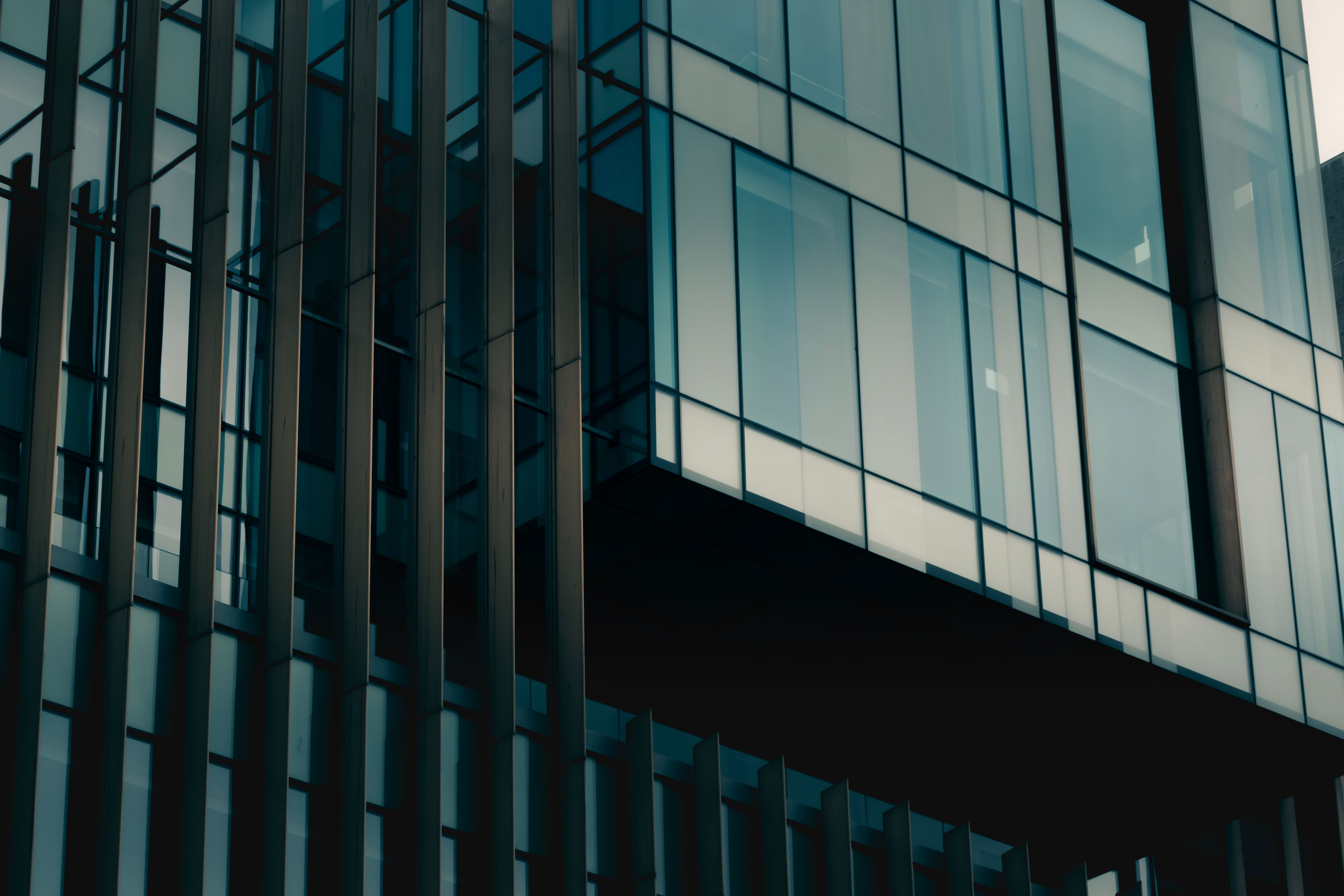 Close-up view of modern glass building architecture in Edinburgh, Scotland.