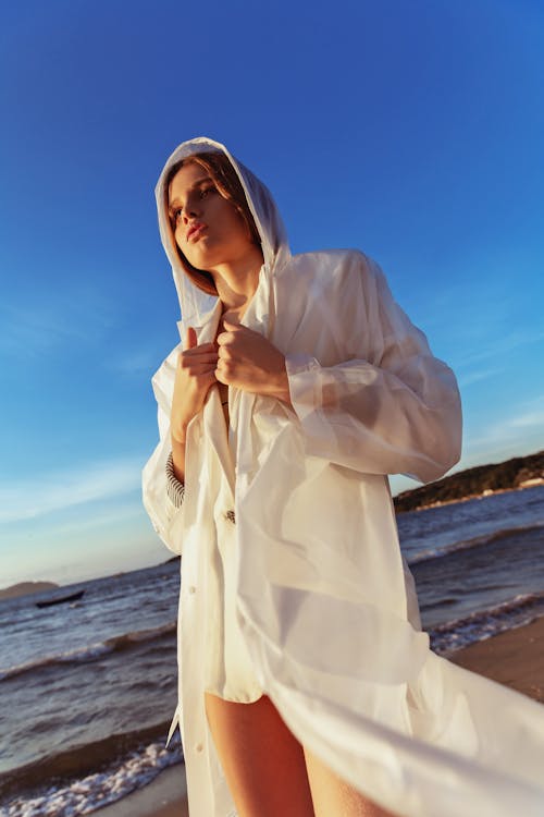 Low Angle Photo of Woman Wearing White Dress