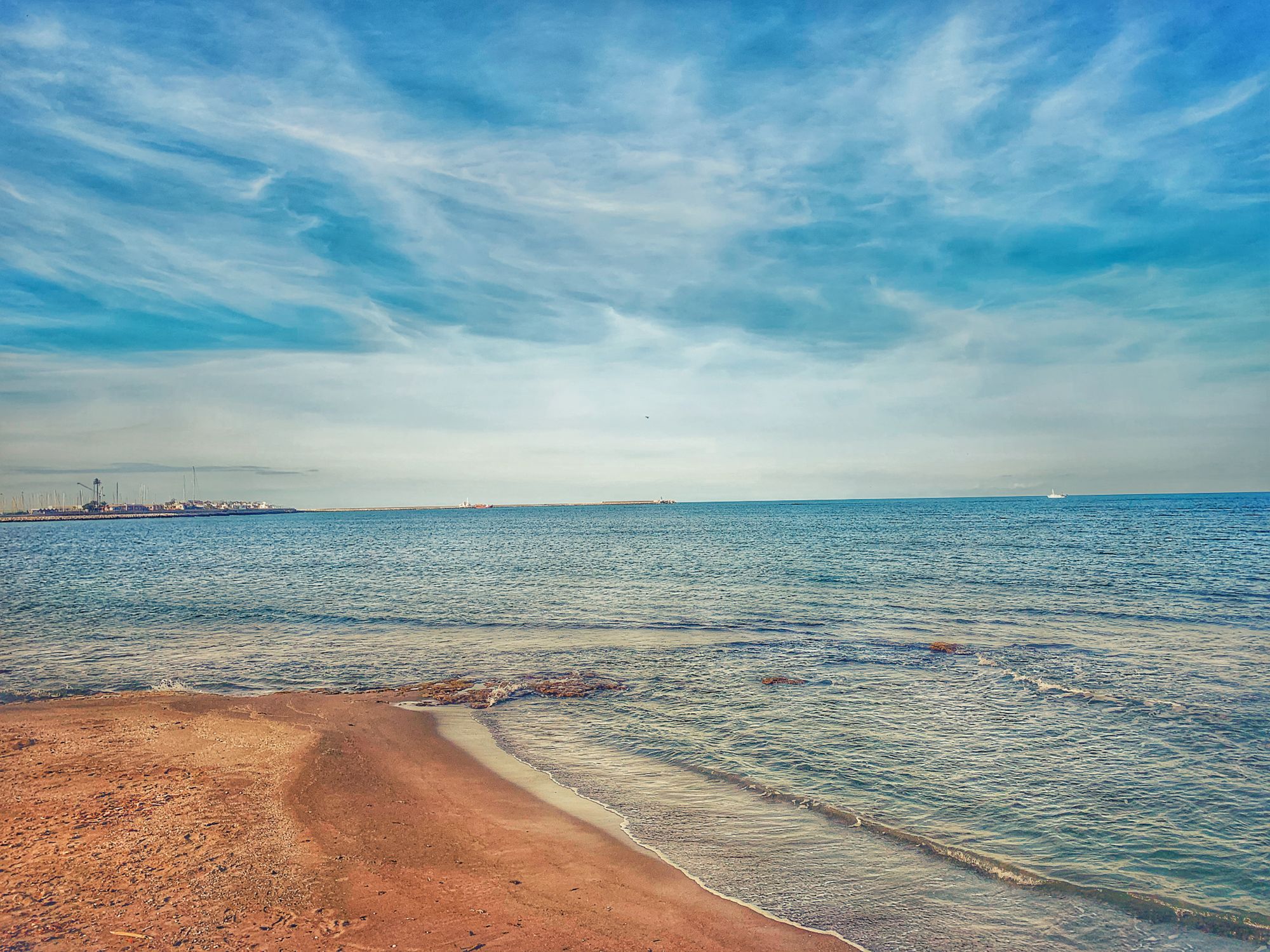 Tranquil Spanish Beach with Azure Waters · Free Stock Photo