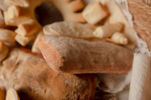 Freshly baked artisan bread assortment with rustic texture and warm tones.