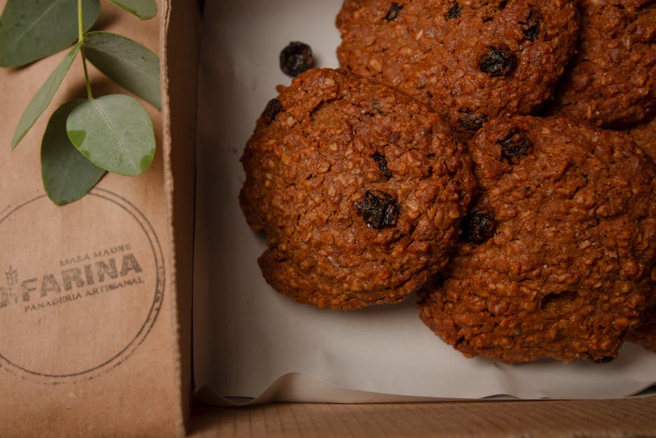 Artisanal homemade cookies packaged in a bakery box ready for delivery