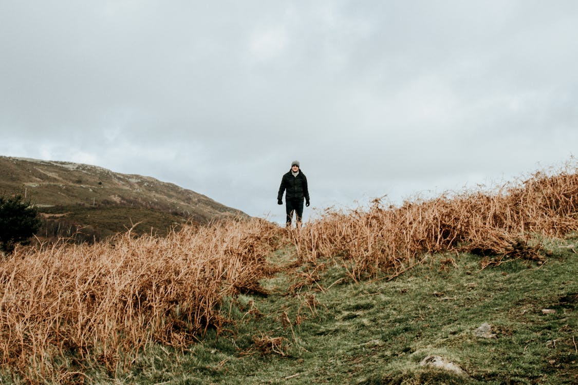 Person Standing on Field