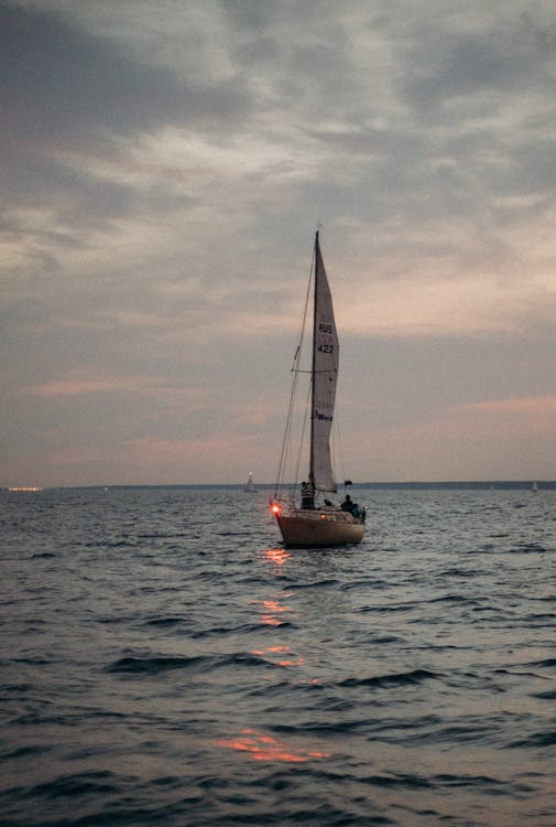 Sailboat on Sea During Golden Hour