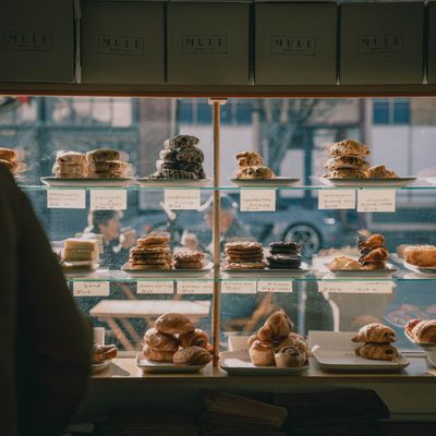 Shelved pantry goods and local groceries