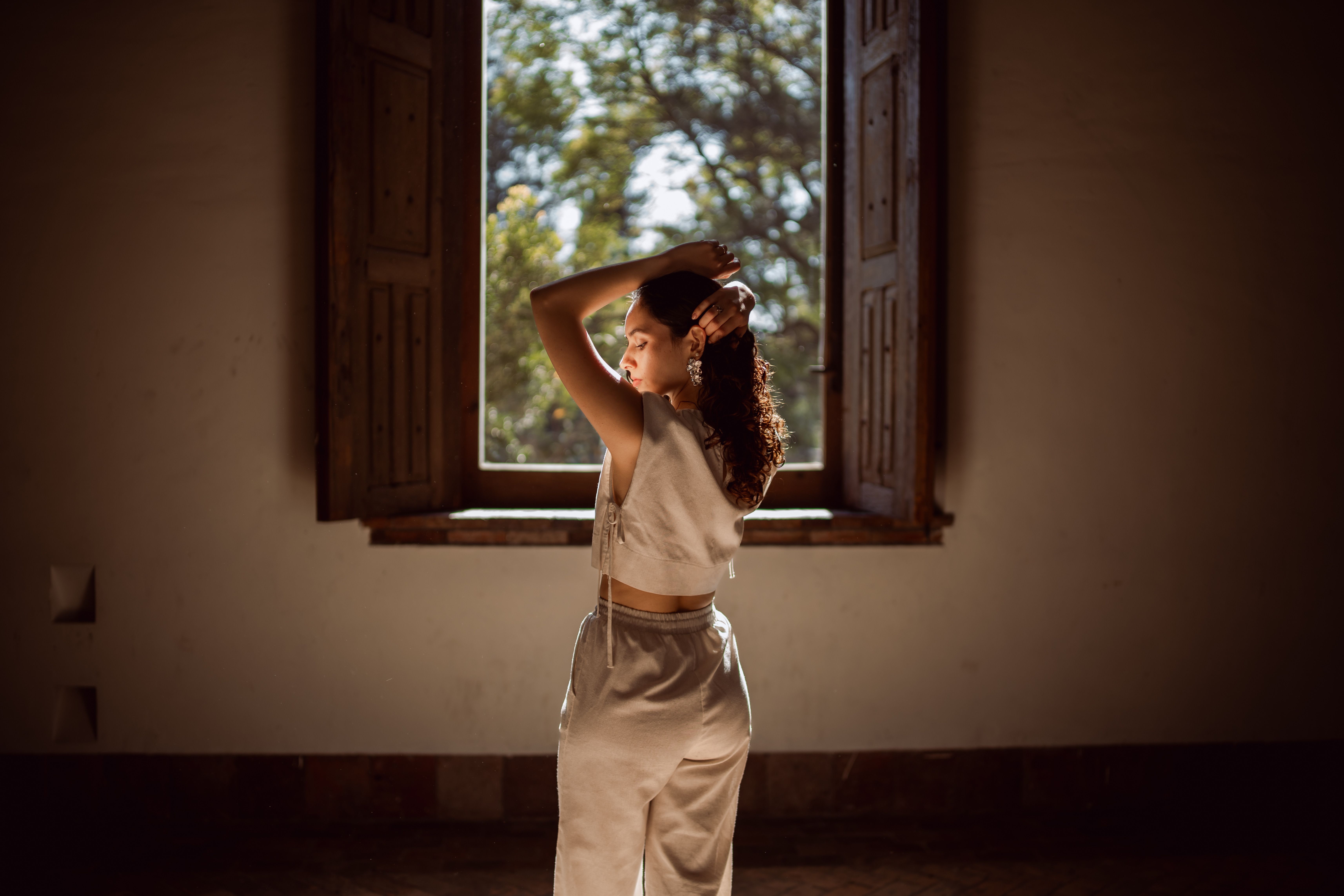 Artistic Portrait of Woman in Natural Light Indoors · Free Stock Photo
