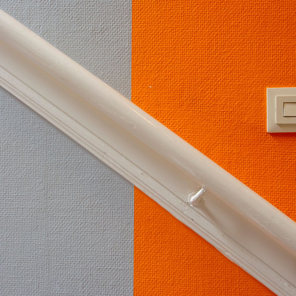 Plastering and Skimming in Lewisham — a decorator at work mid-project