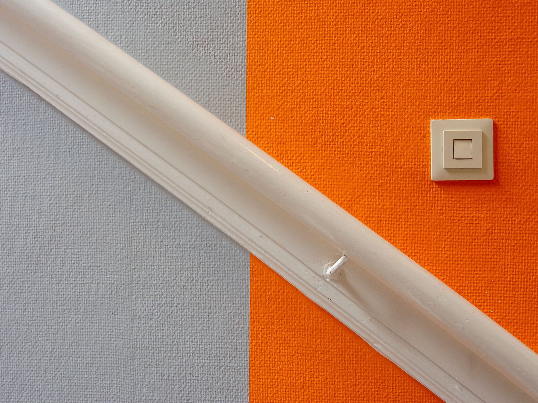 Painters and Decorators in Millbank — a decorator at work mid-project