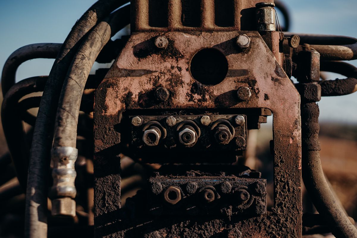Close-up of heavily rusted industrial machinery