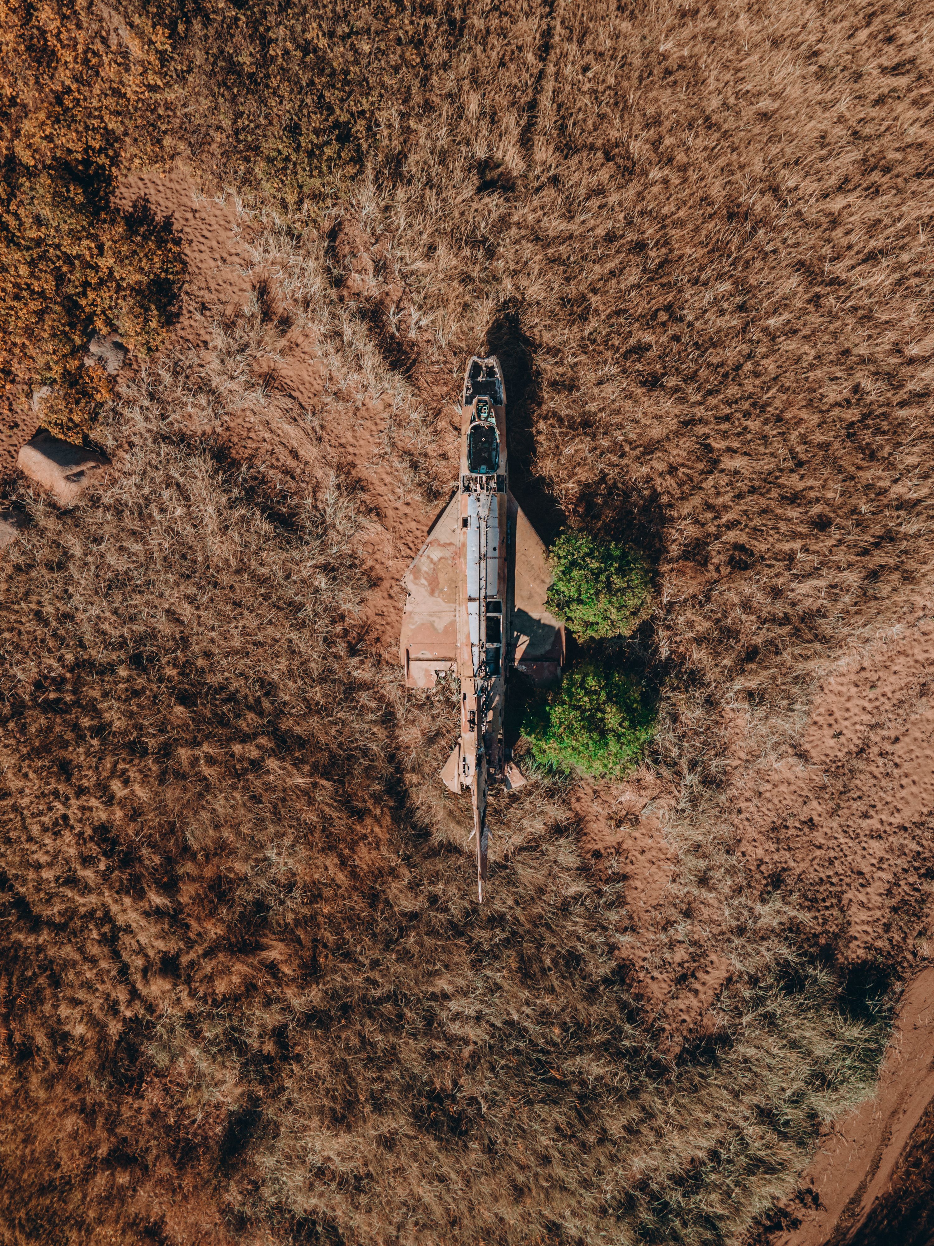 Aerial View of Abandoned Airplane in Field · Free Stock Photo