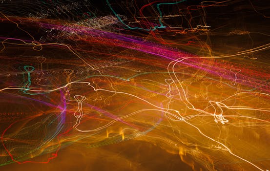 Vibrant long exposure photo capturing colorful light streaks in motion.