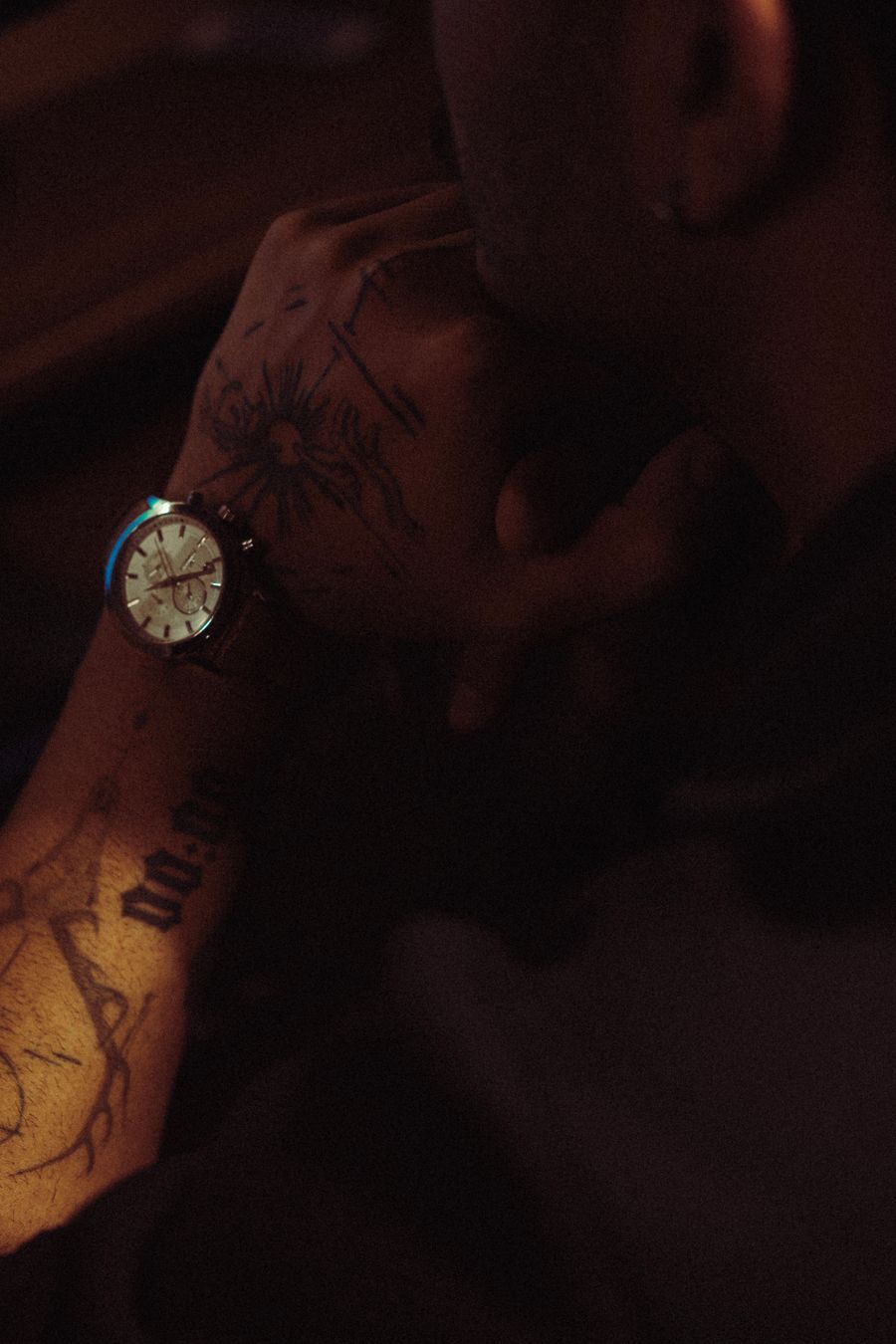Tattooed arm in natural light
