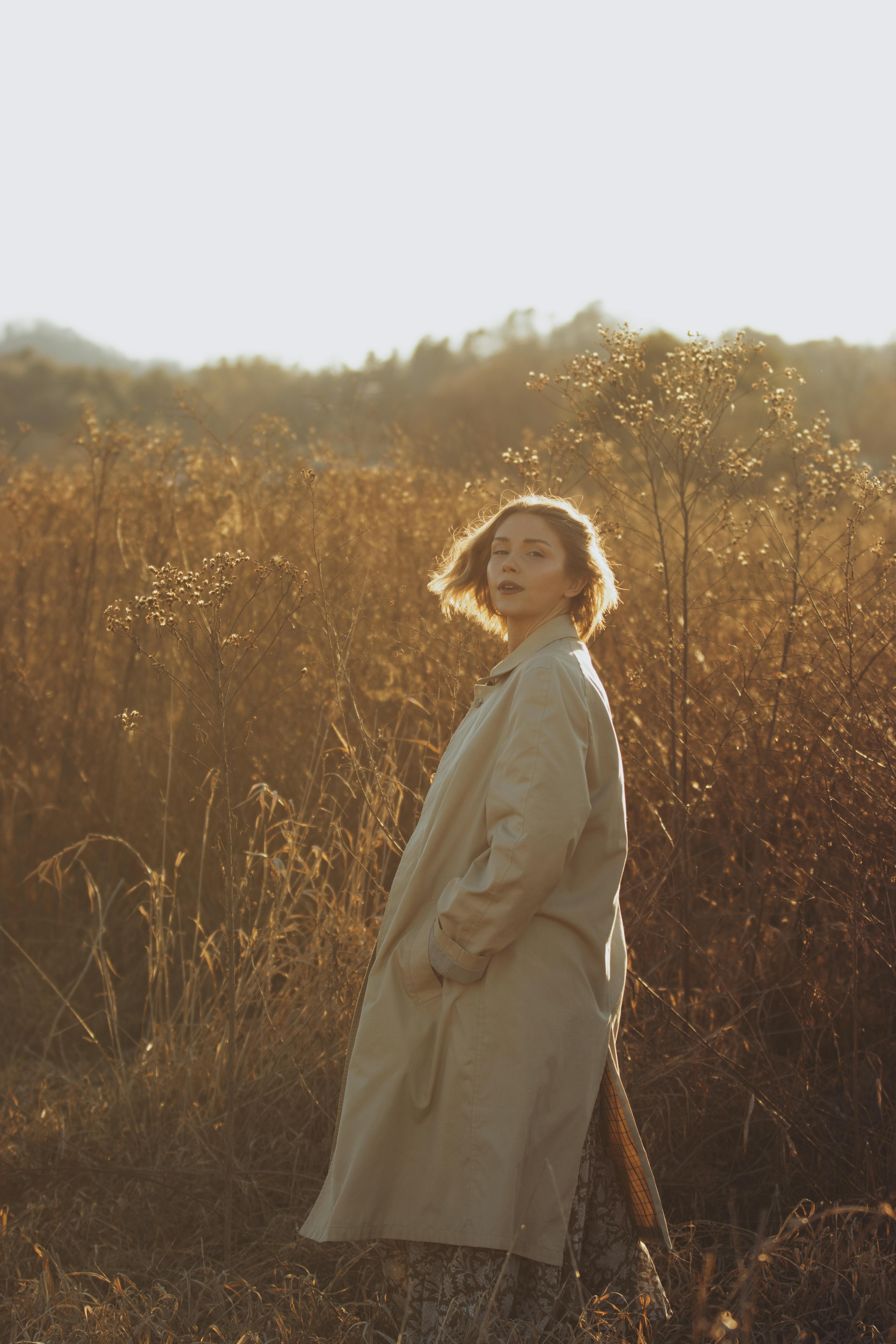 Serene autumn portrait of a woman in Brevard, capturing natural light and earthy tones.