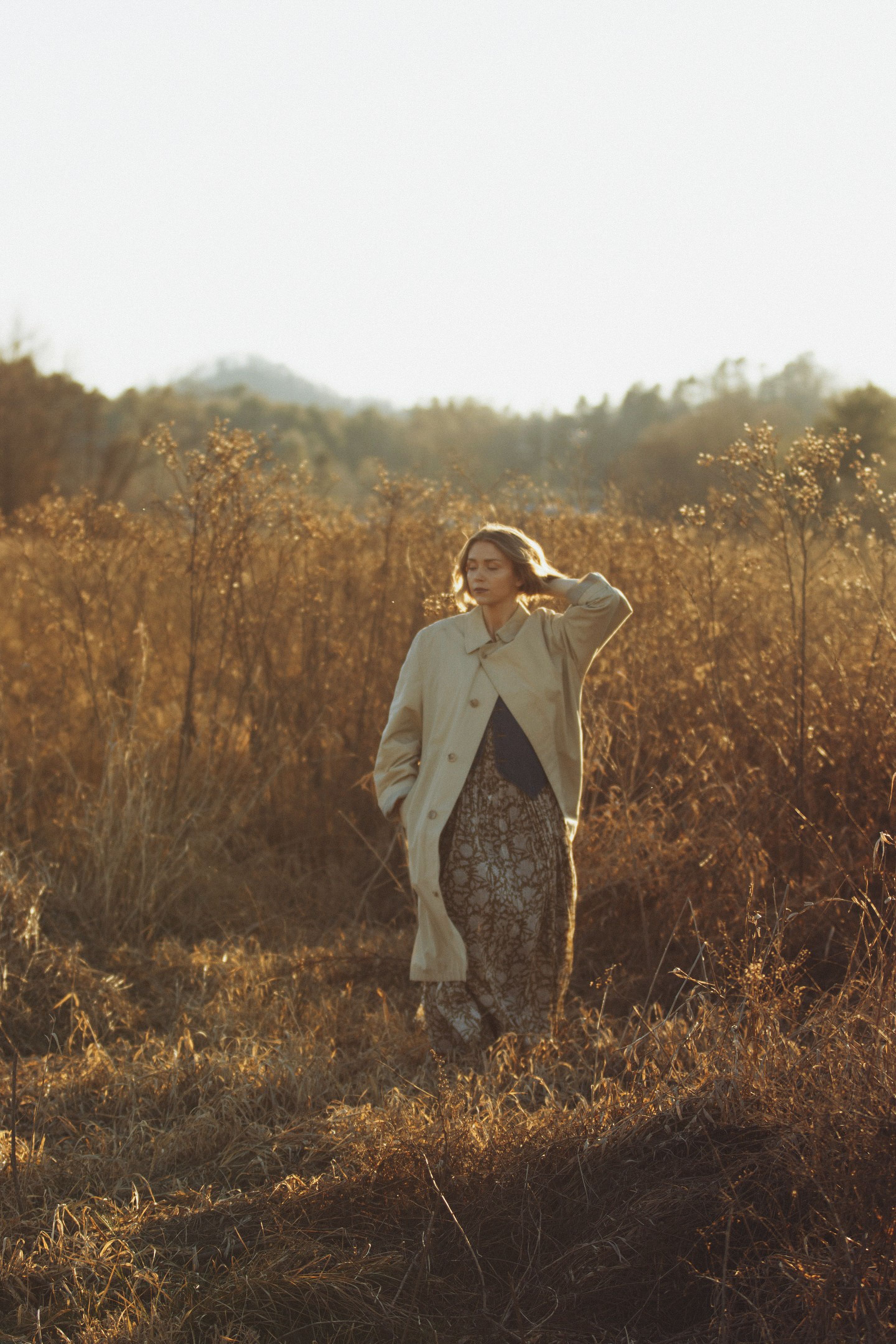 Woman in Field During Golden Hour in Fall · Free Stock Photo