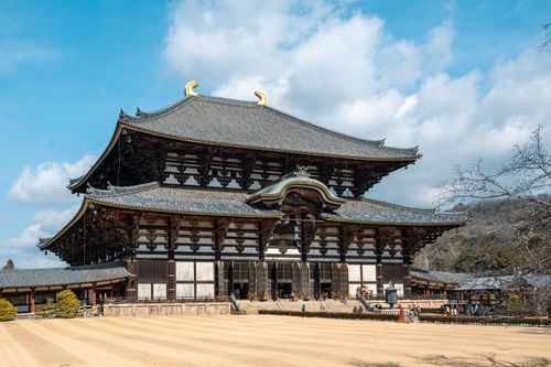 Free Todaiji Temple's majestic architecture in Nara, Japan, on a clear day capturing its historic beauty. Stock Photo