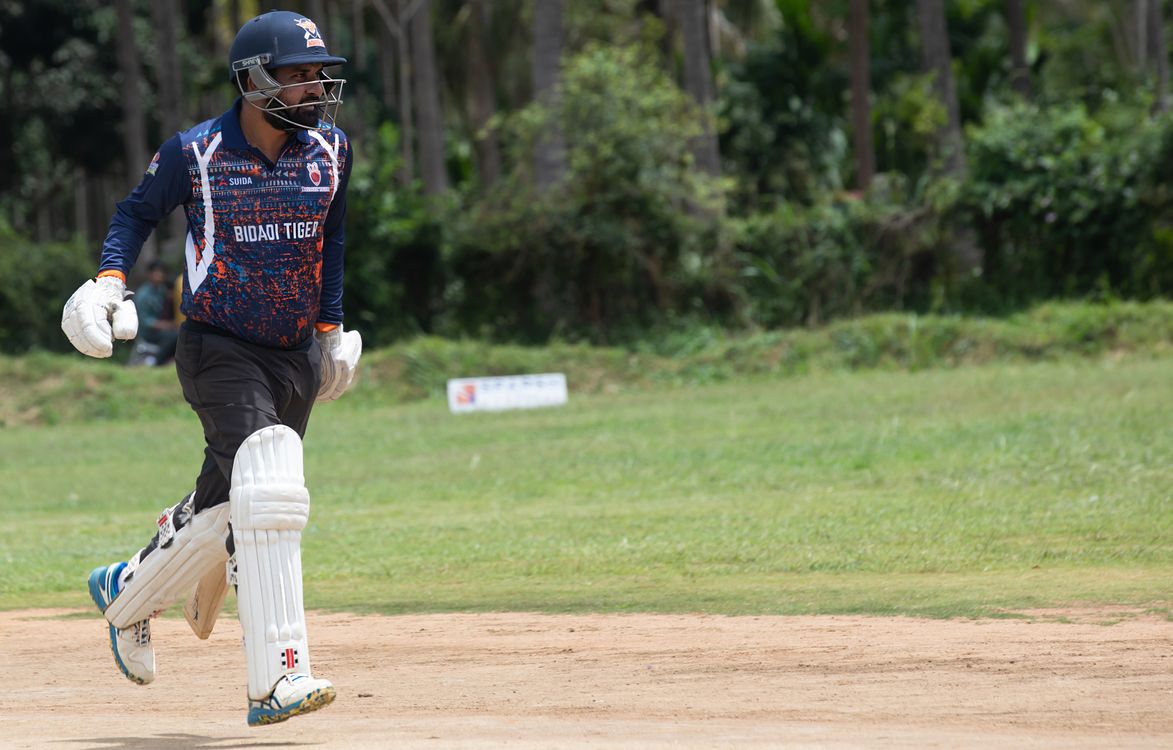 Cricketer Running On Natural Grass Field Free Stock Photo cricketer-running-on-natural-grass-field-free-stock-photo