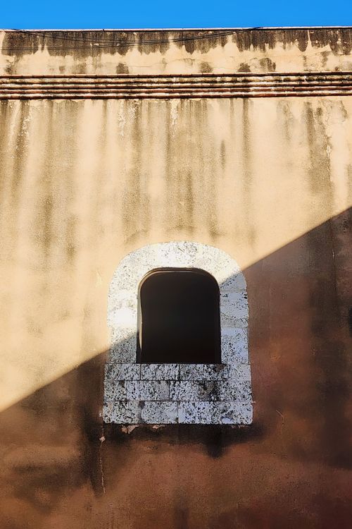 Free Close-up of a historic window on an old structure in Santo Domingo, Dominican Republic. Stock Photo